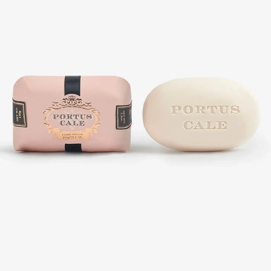 Portus Cale Rosé Blush 150g soap bar shown wrapped in blush pink paper alongside unwrapped ivory bar with embossed logo