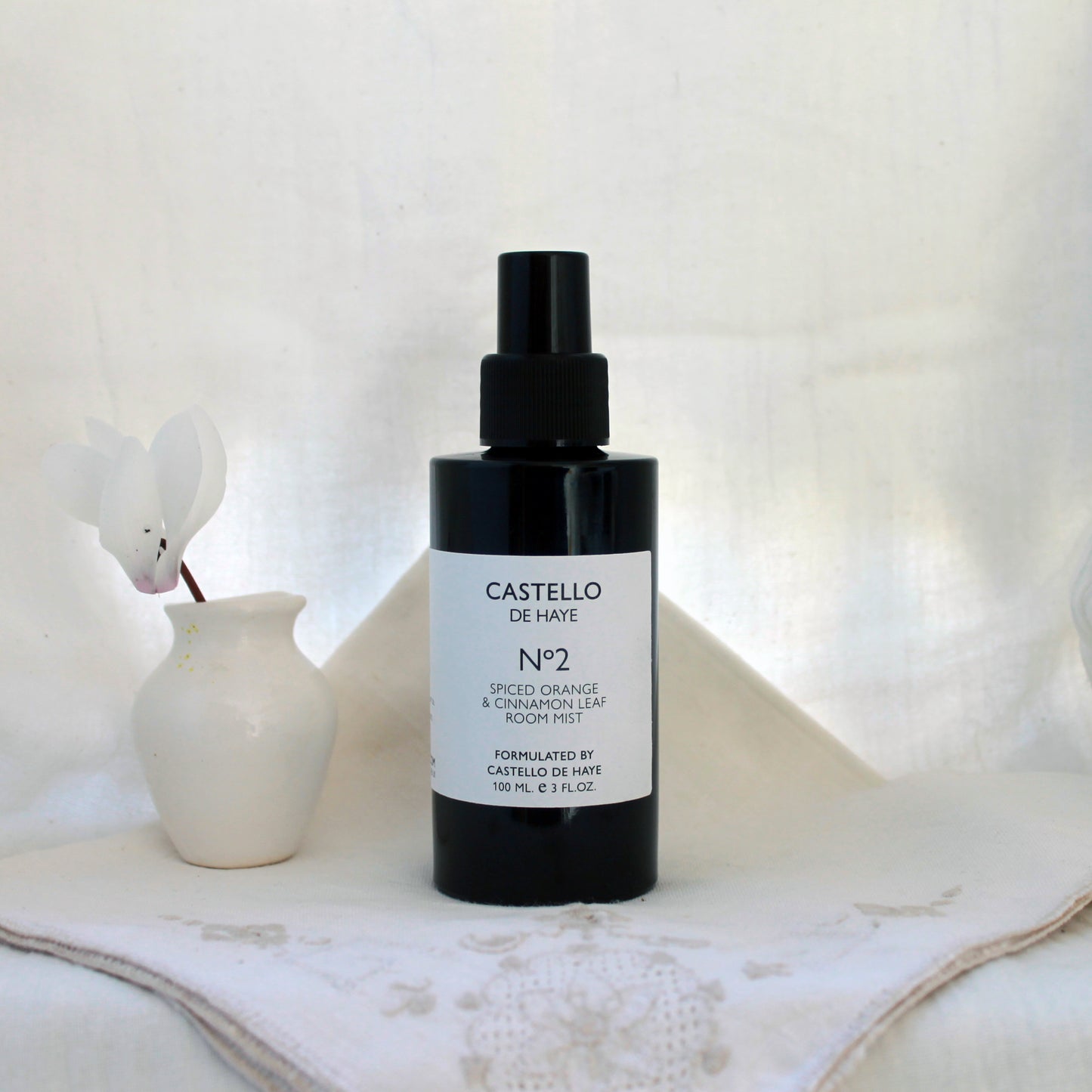 No. 2 spiced orange and cinnamon leaf room mist in black bottle