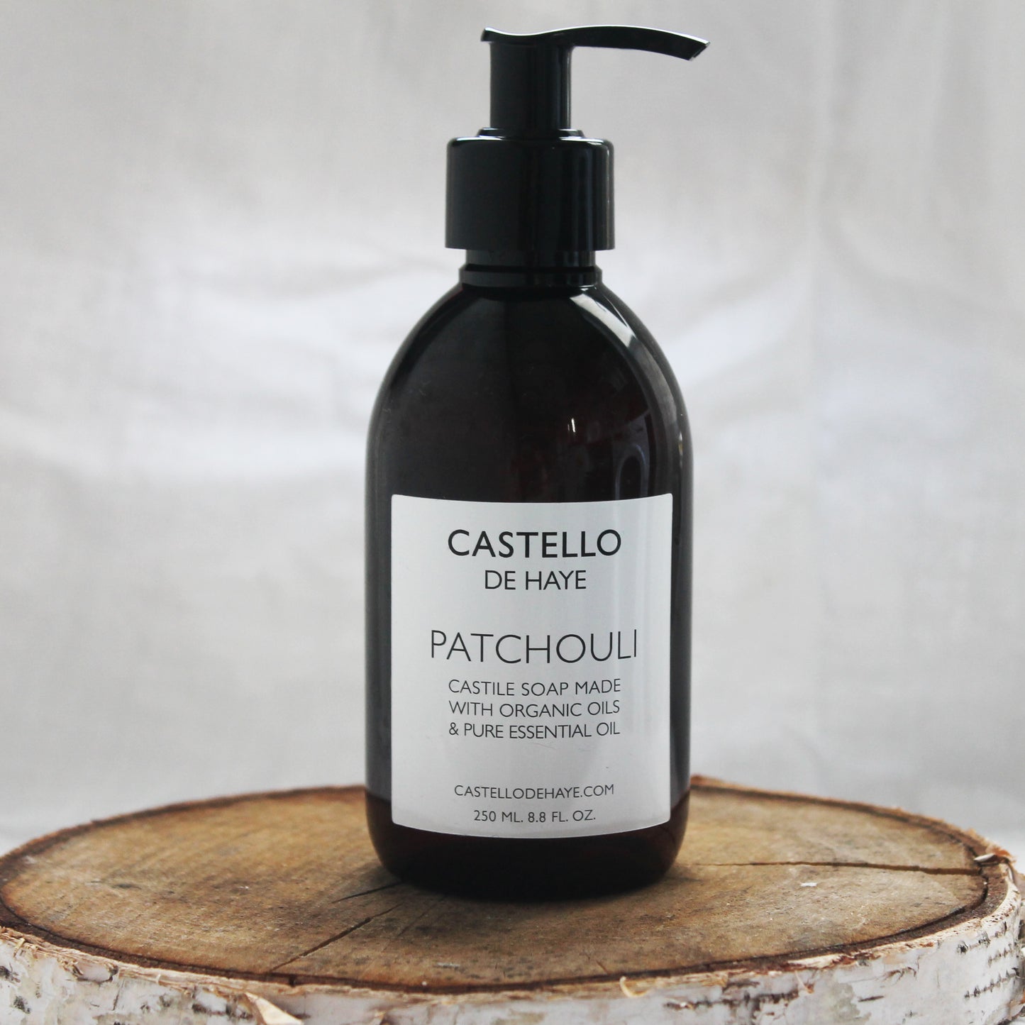 Patchouli castile soap on a wooden shelf