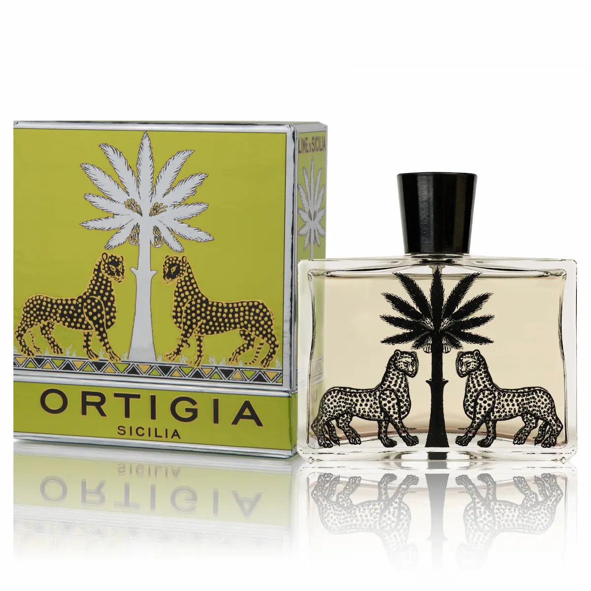 A bottle of Ortigia Sicilia perfume with a black cap, next to its lime green and silver packaging box, both featuring a graphic of two spotted leopards under a palm tree on a white background with a reflection.