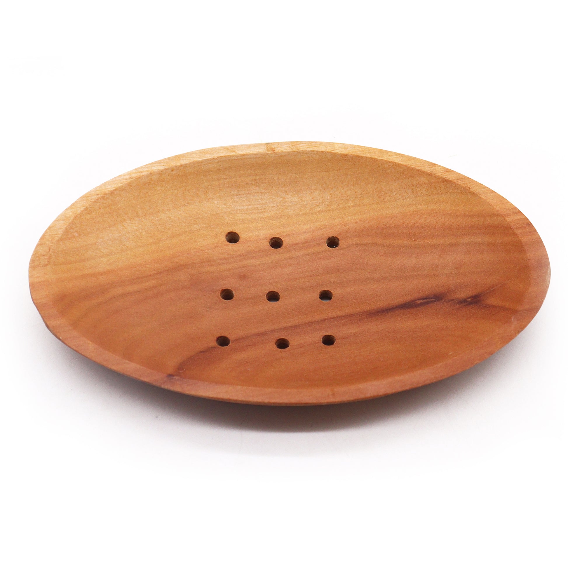 Oval wooden soap dish with drainage holes on white background