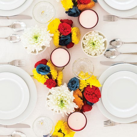Portus Cale Blooming Garden Candle Castelbel on dinner table from above