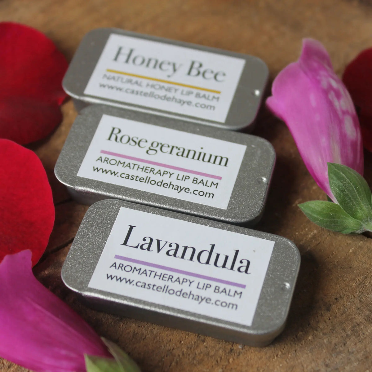 Castello de Haye Honey Bee, Rose geranium and Lavandula lip balm with flowers