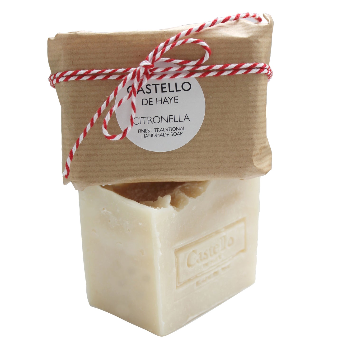 Bar of Castello de Haye Citronella soap wrapped in brown paper with red and white string on a white background.