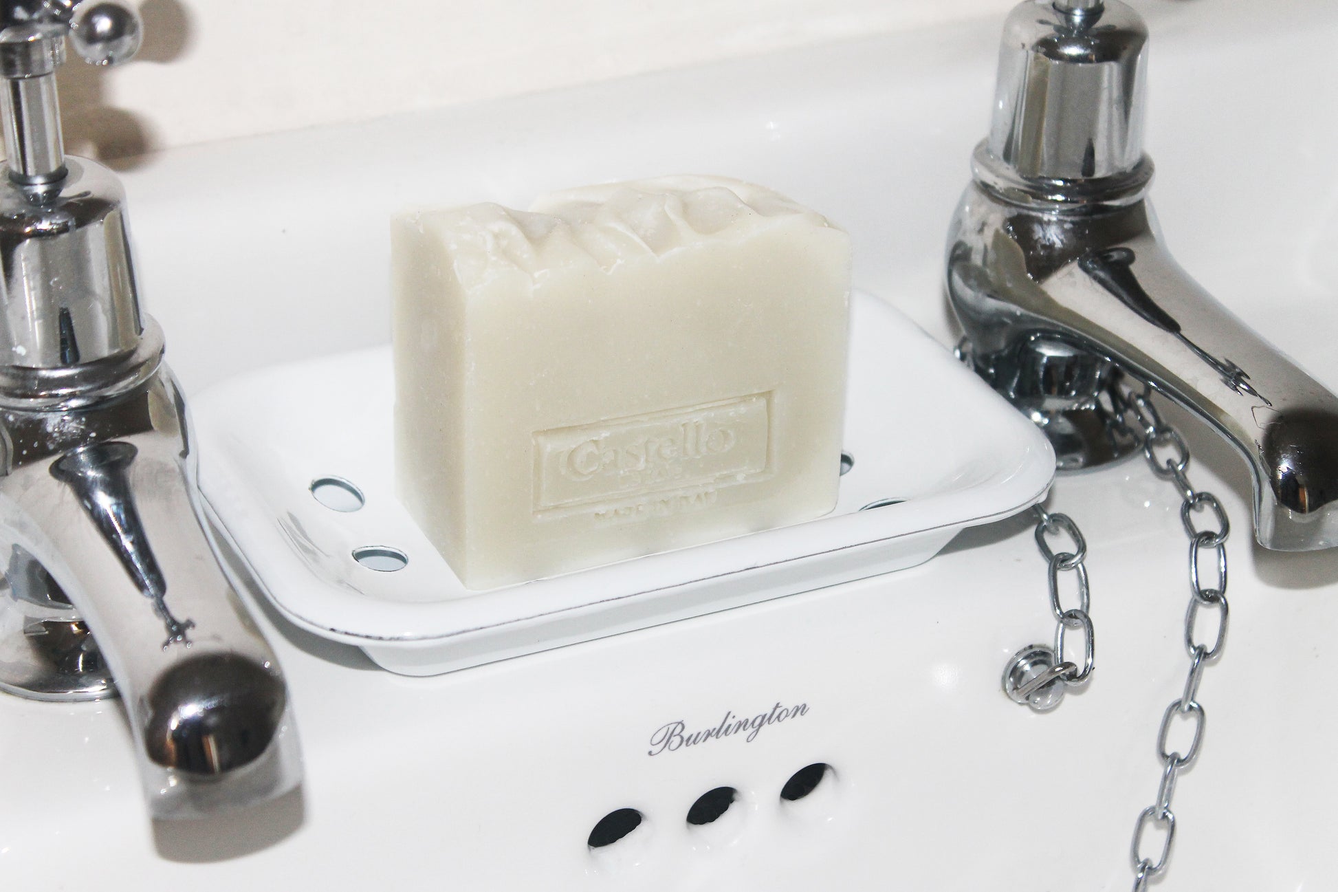 Castello de Haye Soap on pure white enamel soap dish on bathroom sink