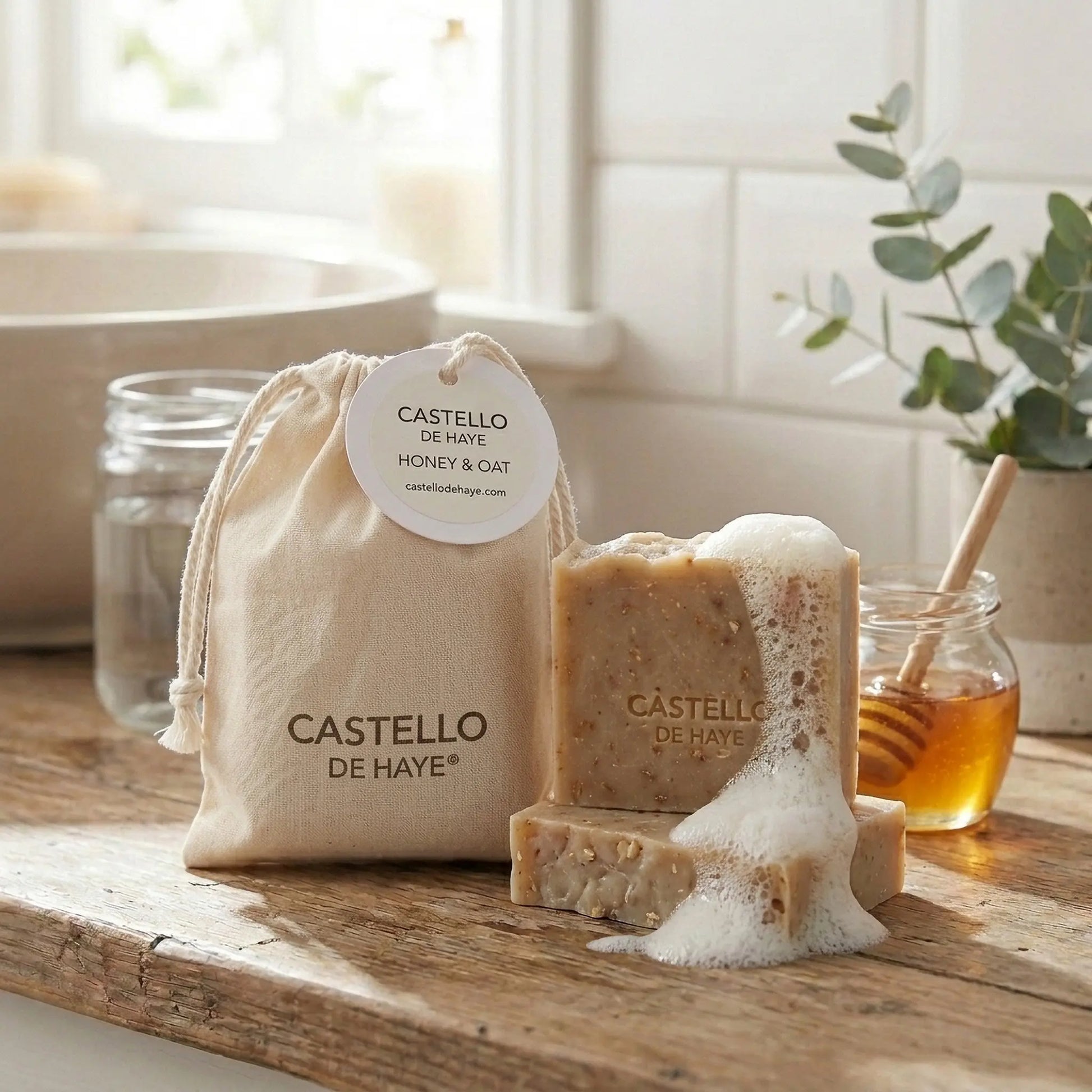 Castello de Haye natural soap bars displayed in a bathroom setting