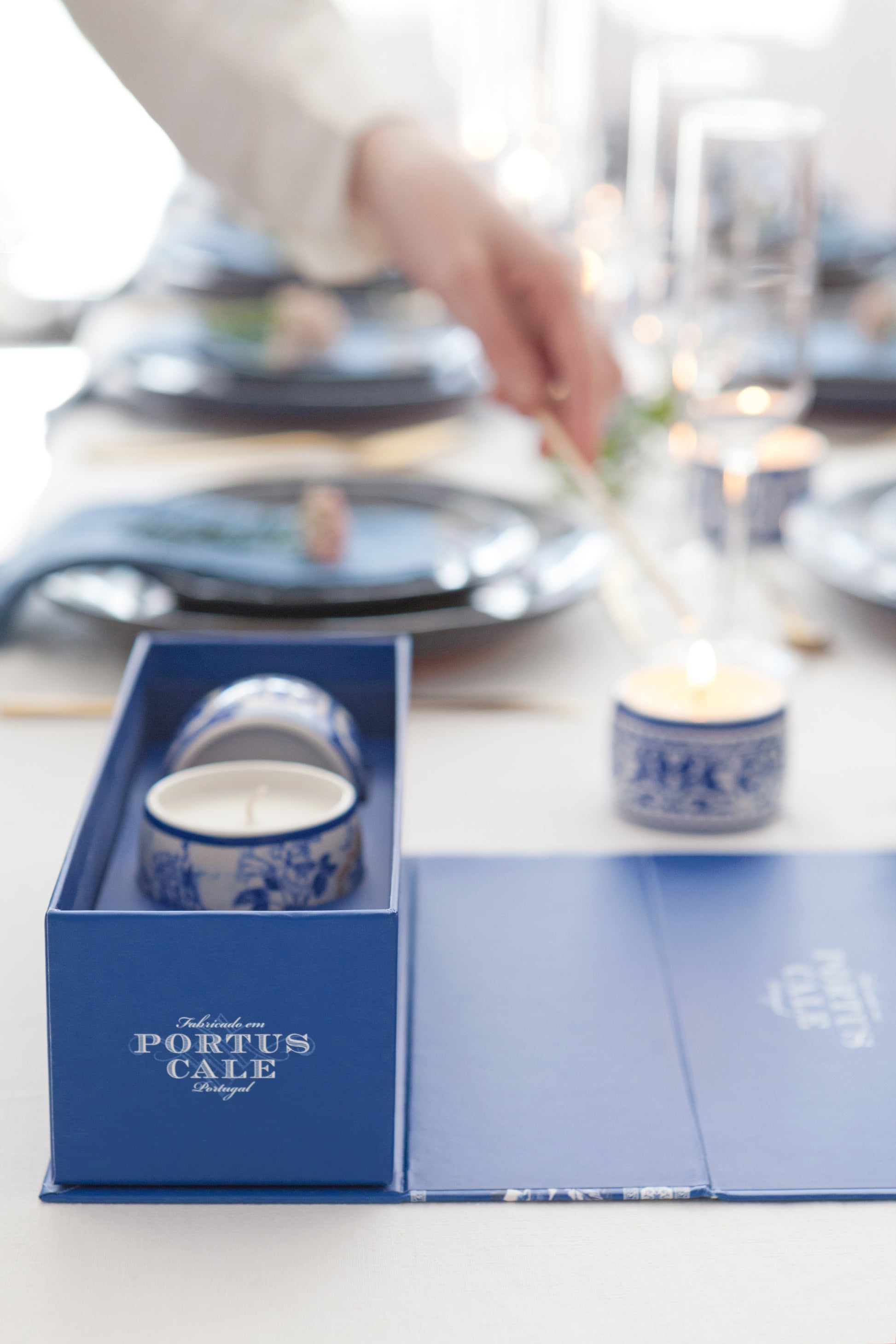 Candle gift set on a dinner table